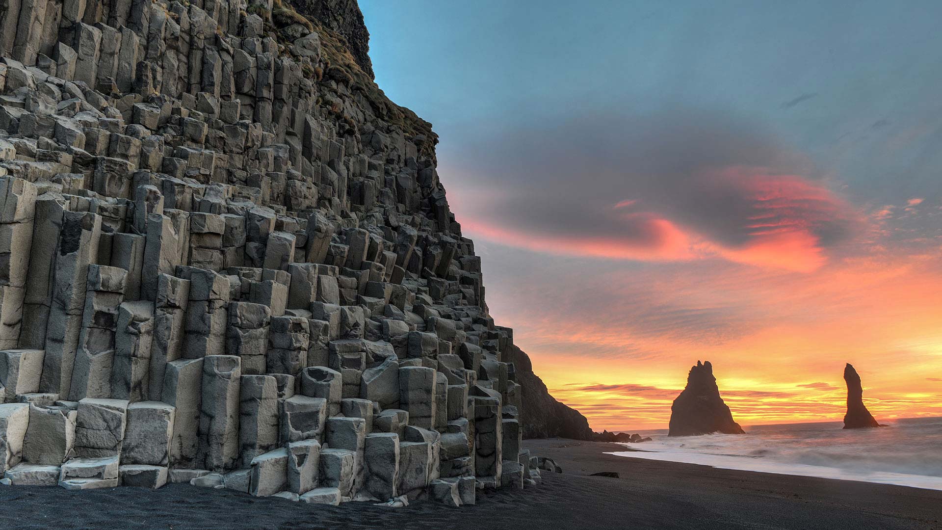 Reynisdrangar basalt rock formation on Reynisfjara beach in South Iceland