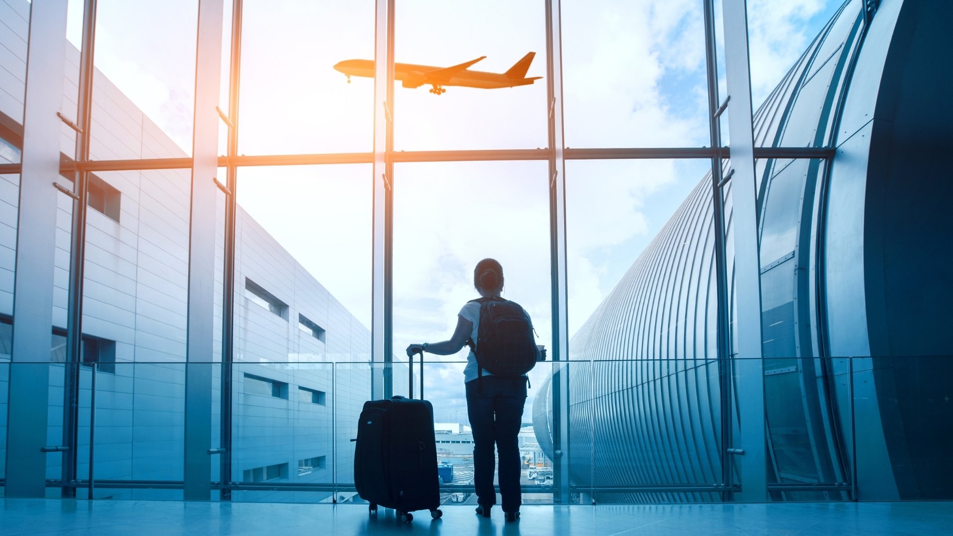traveler on an airport plane